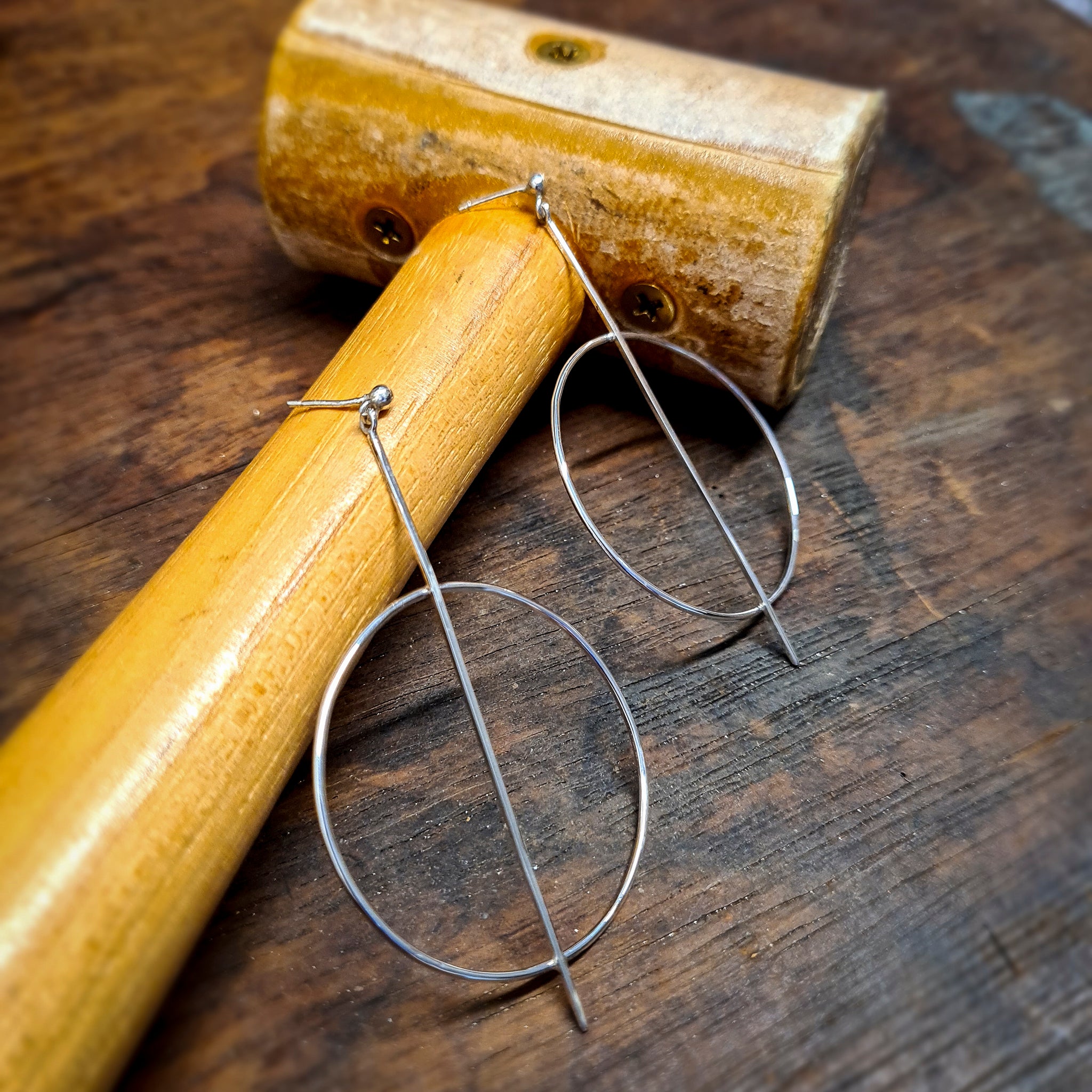 Elementary figures hanging earrings