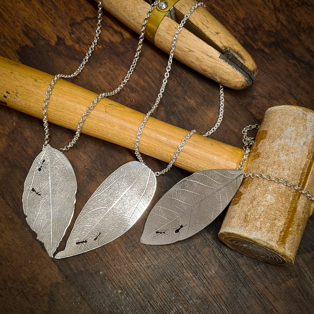 Sterling silver leaf pendant with ants cut out