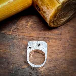 Ring with leaf imprint and ants